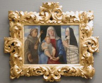 Mária gyermekével Assisi Szt. Ferenccel és Szt. Klárával